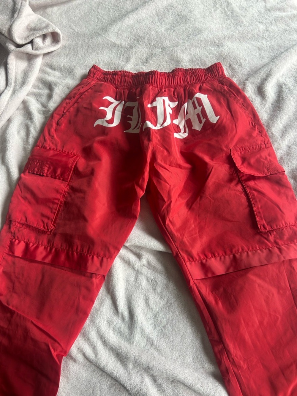 Men's Red Cargo Pants with White Script Logo